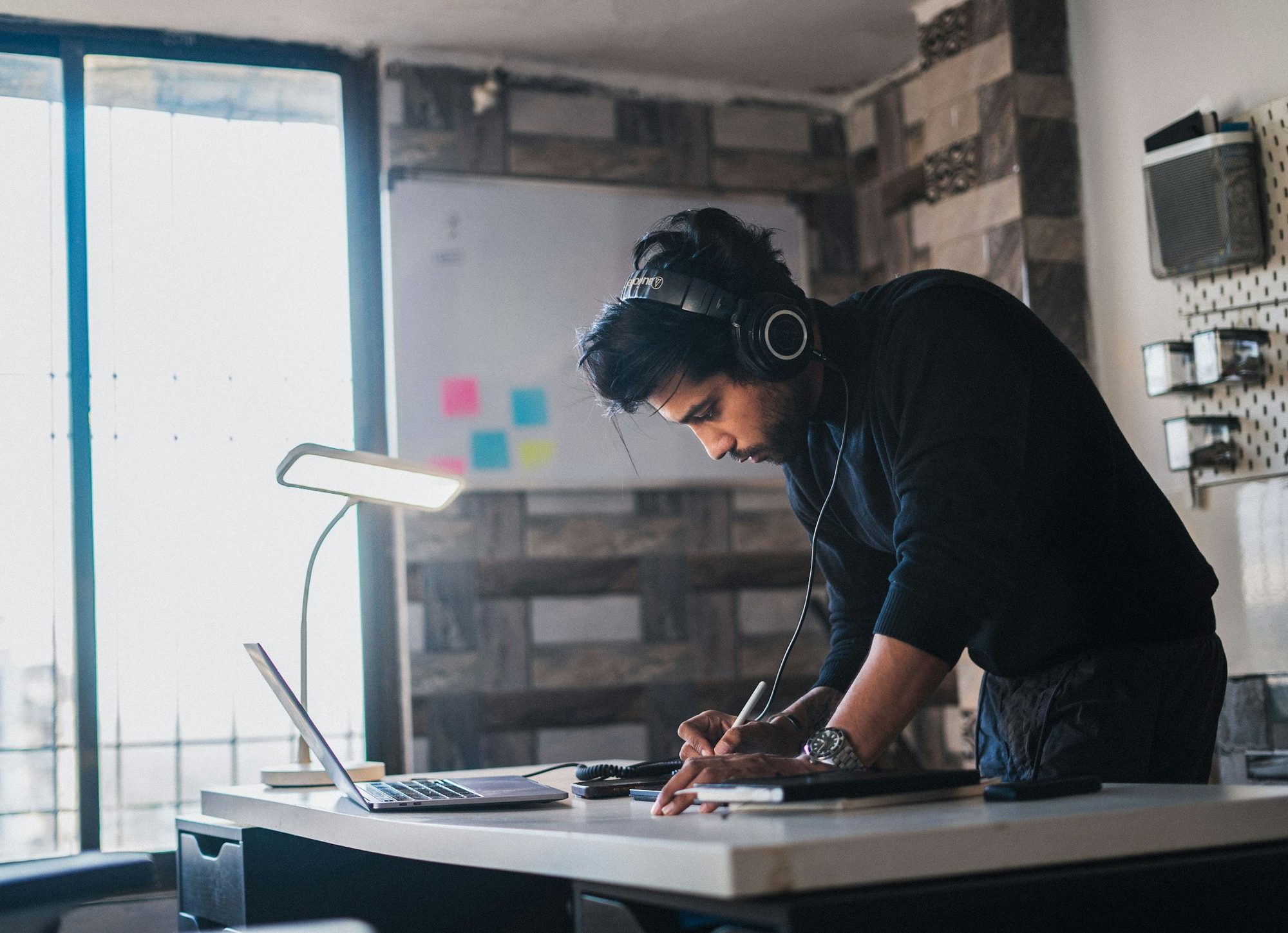 Dispatcher working at a desk with a headset