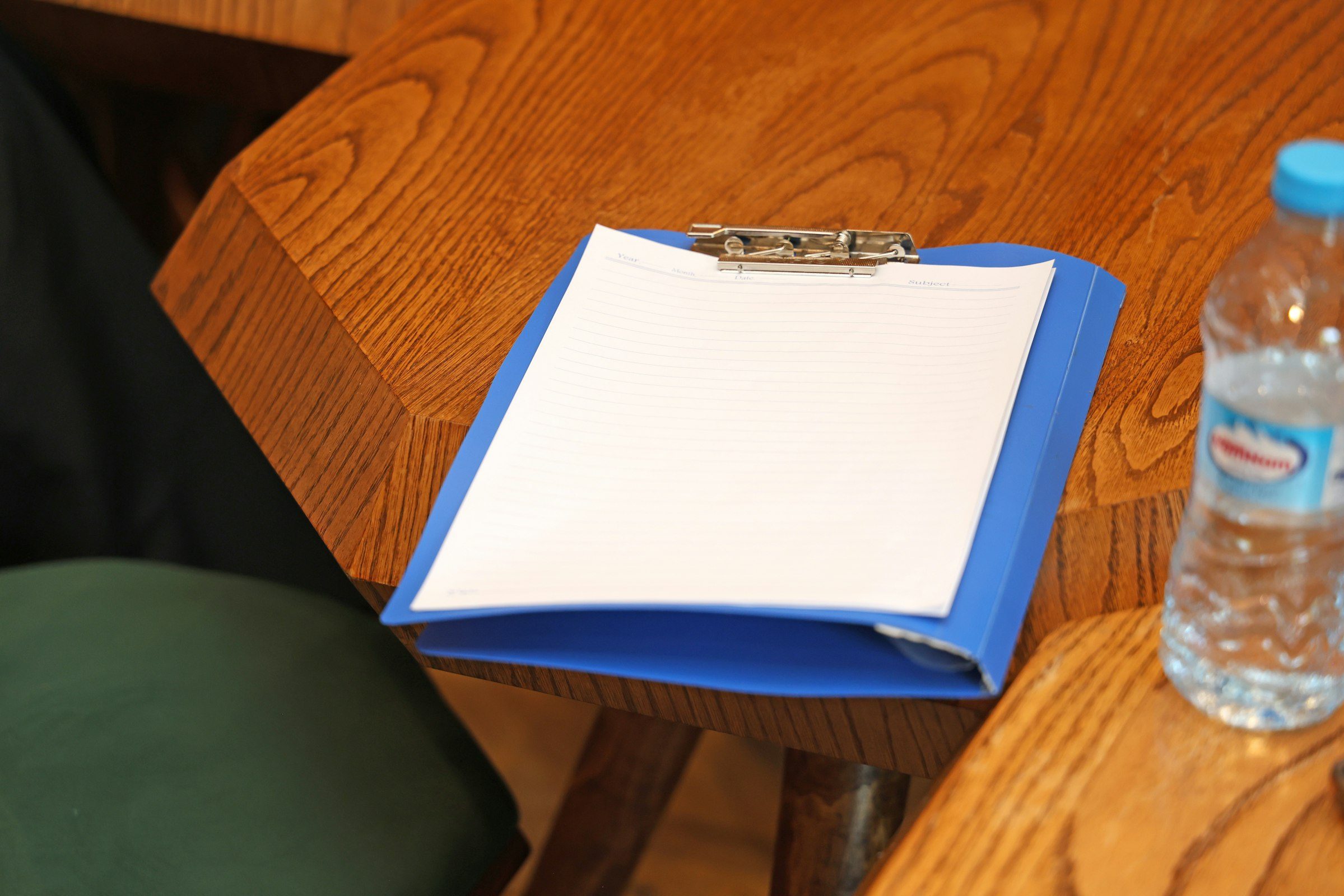 Clipboard with delivery paperwork