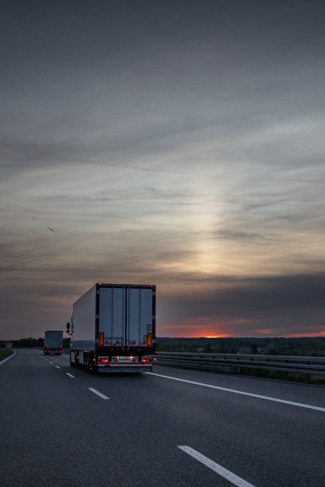 Truck on the highway at sunset