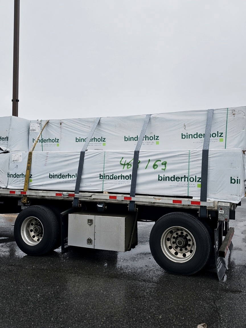 Tarped flatbed load locked for transit